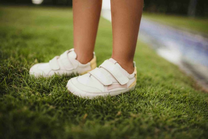 White shoes on grass.